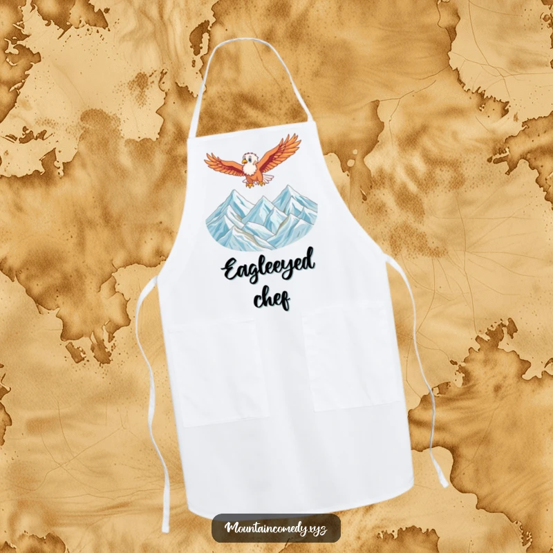 Funny apron featuring an energetic eagle character soaring high above a majestic mountain range, ideal for kitchen adventures.