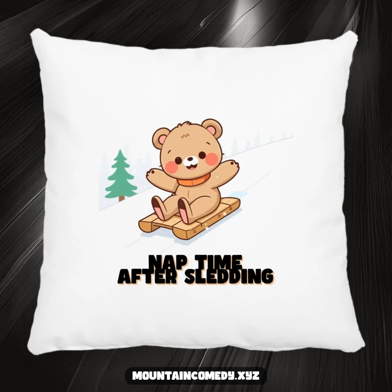 Funny bear cub character joyfully sledding down a snowy mountain, offering comfort and humor on this charming decorative pillow.