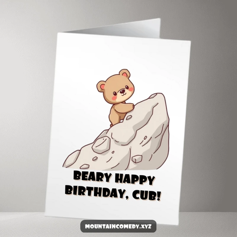 Free printable birthday card with a determined bear cub cub climbing a steep, rocky mountain path, full of brave effort.