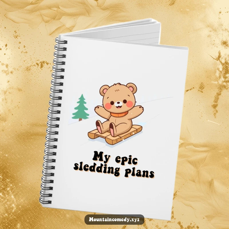 Funny bear cub character sledding down a snowy mountain, ready to inspire notes and ideas in this humorous adventure notebook.