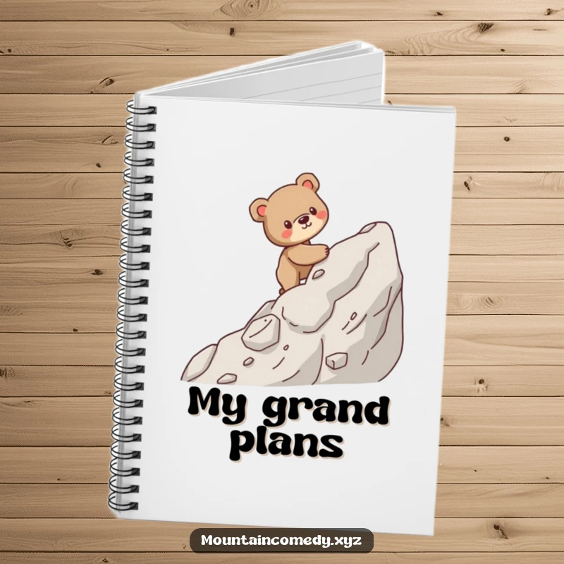 Funny notebook with a sturdy bear cub character carefully climbing a steep, rocky mountain, perfect for goal-setting notes.