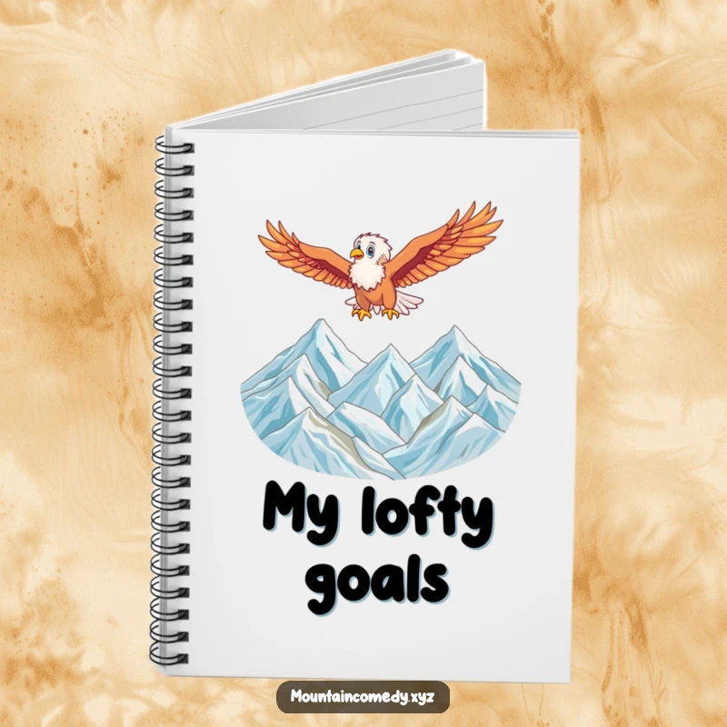 Funny notebook with an energetic eagle character soaring high above a majestic mountain range, perfect for capturing big ideas.
