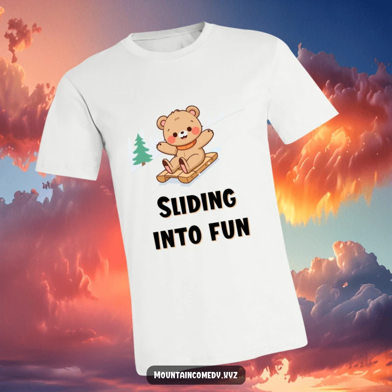 Funny bear cub character expertly sledding down a snowy slope, showcasing exhilarating winter fun on this awesome graphic tee.